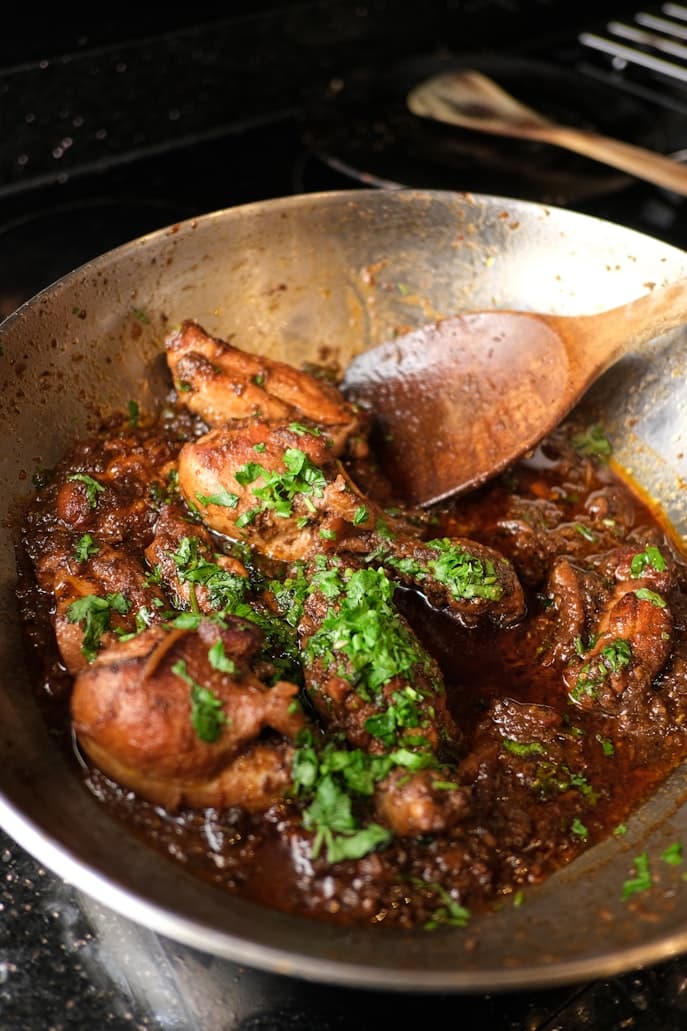Chicken karahi in a steel pot
