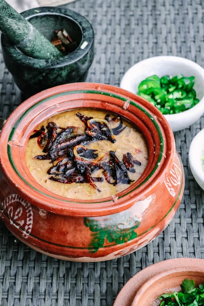Slow-cooked haleem with garnish